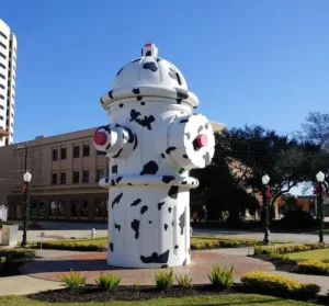 The iconic dalmatian-spotted "World's Largest Fire Hydrant" in Beaumont, Texas, representing V Pro Towing’s primary local service area.